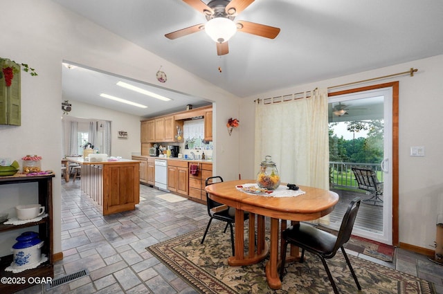 3759 Wheeler Branch Rd, Crane, MO 65633 - dining space with lofted ceiling, a ceiling fan, plenty of natural light, and light stone finish flooring