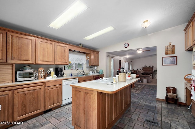 3759 Wheeler Branch Rd, Crane, MO 65633 - kitchen featuring dishwasher, light countertops, a center island, ceiling fan, and open floor plan