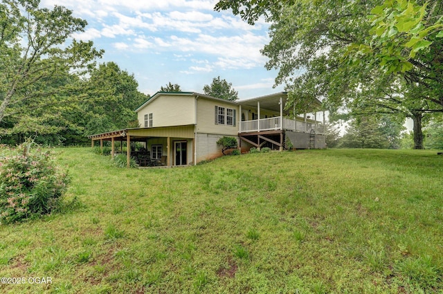 3759 Wheeler Branch Rd, Crane, MO 65633 - back of property with a wooden deck and a lawn