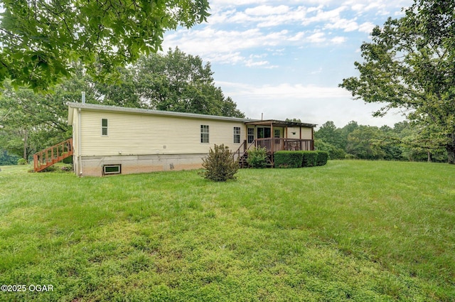 3759 Wheeler Branch Rd, Crane, MO 65633 - rear view of house with stairway, a yard, and a wooden deck