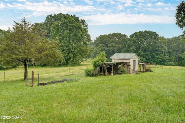 3759 Wheeler Branch Rd, Crane, MO 65633 - view of yard featuring an outdoor structure, a rural view, and a wooded view