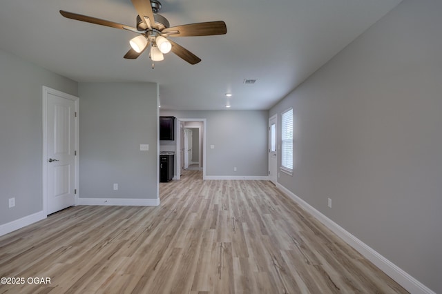 unfurnished living room with light wood-style floors, ceiling fan, and recessed lighting