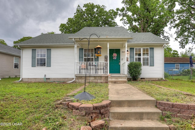 2413 Rolla St, Joplin, MO 64801 - bungalow-style house with covered porch, crawl space, and a shingled roof
