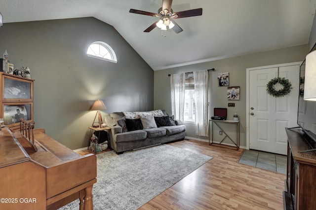 2413 Rolla St, Joplin, MO 64801 - living area with ceiling fan, lofted ceiling, light wood-style floors, baseboards, and an office area