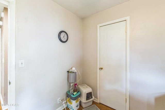 1426 Greenwood Blvd, Neosho, MO 64850 - laundry room featuring wood finished floors and baseboards