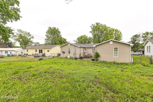 1426 Greenwood Blvd, Neosho, MO 64850 - rear view of property featuring central AC unit