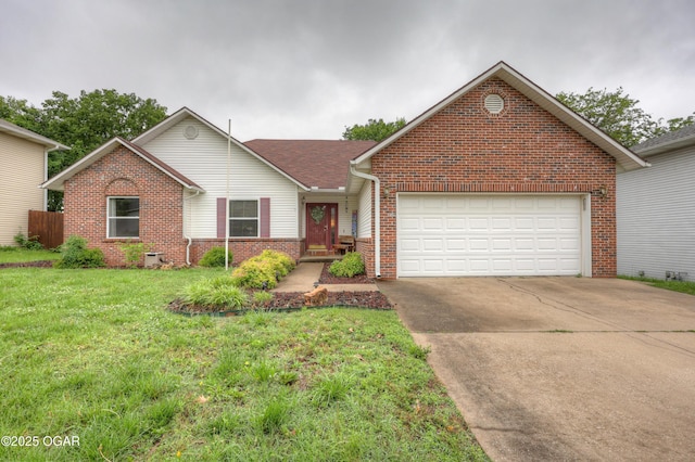 1241 Douglas Ct, Carthage, MO 64836 - view of front of house featuring brick siding, an attached garage, concrete driveway, and a front lawn