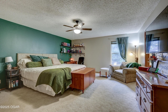 1241 Douglas Ct, Carthage, MO 64836 - bedroom featuring light colored carpet, a textured ceiling, and ceiling fan
