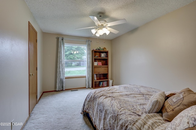 1241 Douglas Ct, Carthage, MO 64836 - bedroom featuring carpet, baseboards, a textured ceiling, and ceiling fan