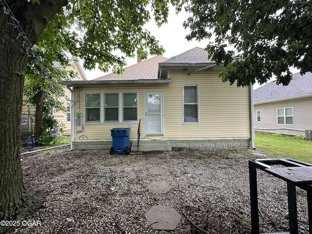 2022 S Jackson Ave, Joplin, MO 64804 - rear view of property with roof with shingles and central AC unit