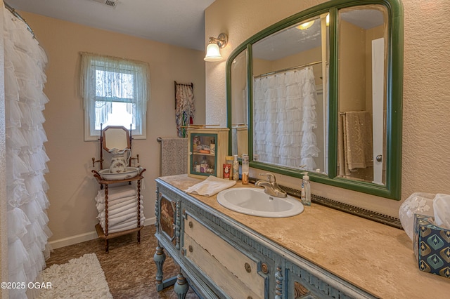 4430 E 26th St, Joplin, MO 64804 - full bathroom with vanity and baseboards