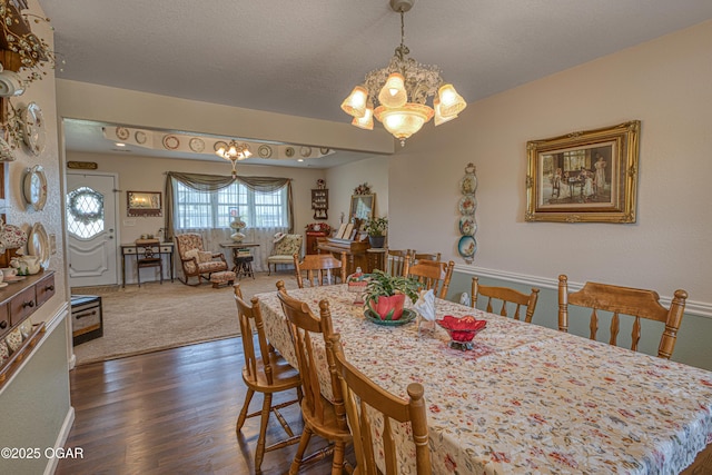 4430 E 26th St, Joplin, MO 64804 - dining area with a chandelier and dark wood-style floors