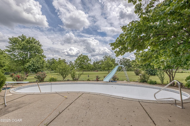 4430 E 26th St, Joplin, MO 64804 - view of swimming pool featuring a yard