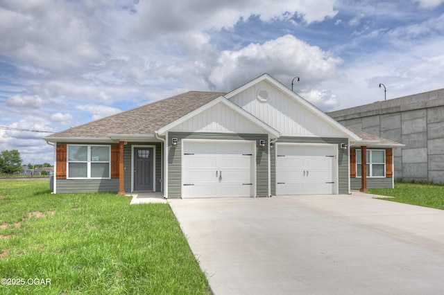 1919 Wisconsin Ave, Joplin, MO 64804 - view of front facade with an attached garage, concrete driveway, a front lawn, and a shingled roof