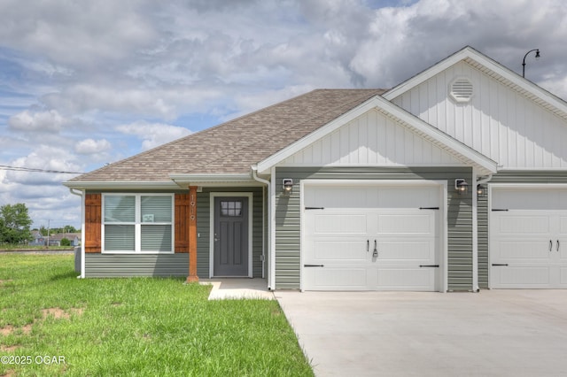 1919 Wisconsin Ave, Joplin, MO 64804 - view of property featuring driveway, an attached garage, a shingled roof, and a front lawn