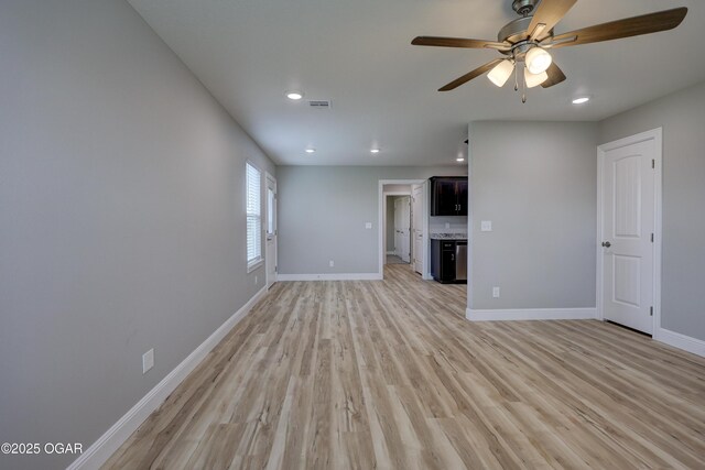 1919 Wisconsin Ave, Joplin, MO 64804 - unfurnished living room with ceiling fan, recessed lighting, and light wood-style floors