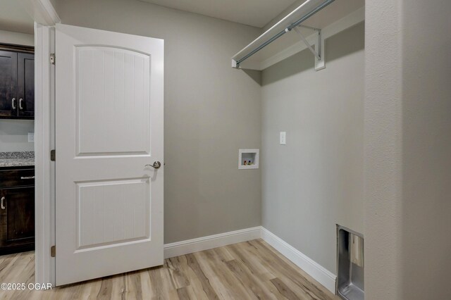 1919 Wisconsin Ave, Joplin, MO 64804 - laundry area featuring washer hookup and light wood-style flooring