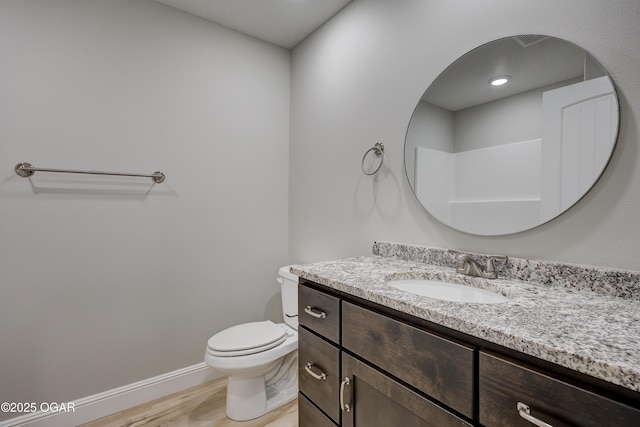 1919 Wisconsin Ave, Joplin, MO 64804 - bathroom with vanity and wood finished floors