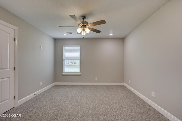 1919 Wisconsin Ave, Joplin, MO 64804 - spare room featuring a ceiling fan, light colored carpet, and recessed lighting