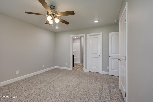 1919 Wisconsin Ave, Joplin, MO 64804 - unfurnished bedroom with recessed lighting, light colored carpet, ensuite bathroom, and a ceiling fan