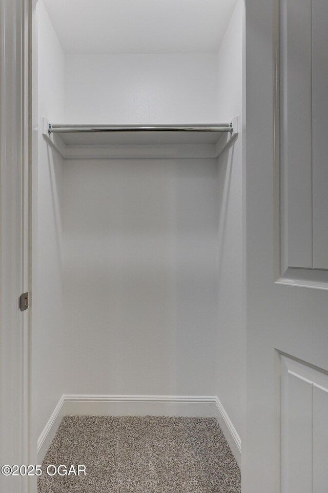 1919 Wisconsin Ave, Joplin, MO 64804 - walk in closet featuring carpet