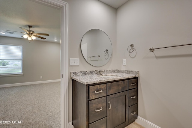 1919 Wisconsin Ave, Joplin, MO 64804 - bathroom featuring vanity and a ceiling fan