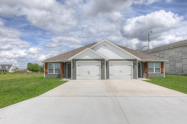 1919 Wisconsin Ave, Joplin, MO 64804 - ranch-style house with an attached garage, concrete driveway, a front yard, and roof with shingles