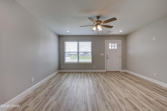 1919 Wisconsin Ave, Joplin, MO 64804 - entryway with ceiling fan and light wood finished floors