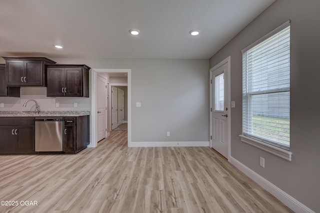 1919 Wisconsin Ave, Joplin, MO 64804 - kitchen with dishwasher, dark brown cabinets, light wood finished floors, and recessed lighting