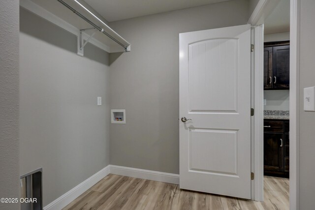 1919 Wisconsin Ave, Joplin, MO 64804 - laundry area with washer hookup and light wood-type flooring