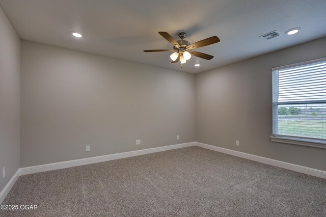 1919 Wisconsin Ave, Joplin, MO 64804 - unfurnished room featuring light colored carpet, ceiling fan, and recessed lighting