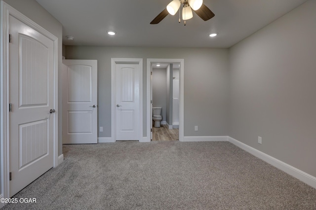 1919 Wisconsin Ave, Joplin, MO 64804 - unfurnished bedroom featuring light carpet, ensuite bathroom, recessed lighting, and ceiling fan