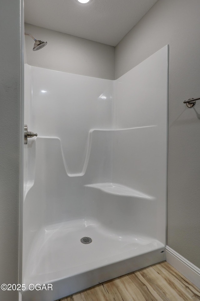 1919 Wisconsin Ave, Joplin, MO 64804 - bathroom featuring wood finished floors and a shower