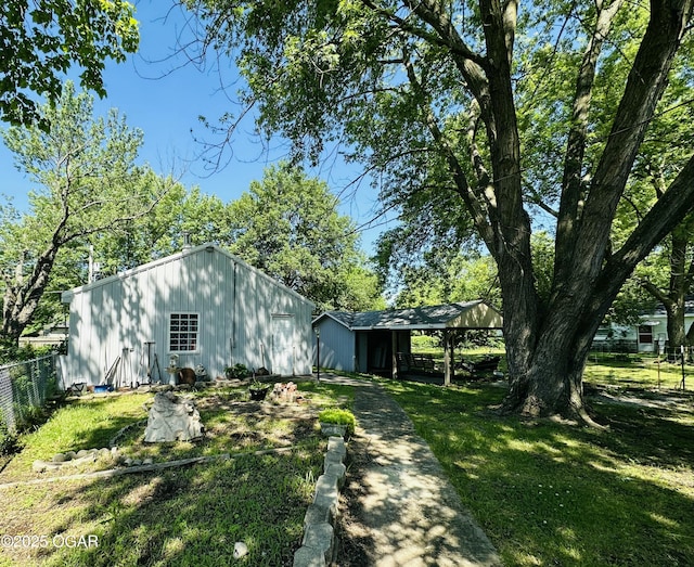 210 S 3 Rd, St, Arma, KS 66712 - view of side of property featuring an outbuilding and an outdoor structure