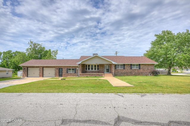720 Sheridan Ave, Carl Junction, MO 64834 - ranch-style home with brick siding, a garage, driveway, and a front lawn