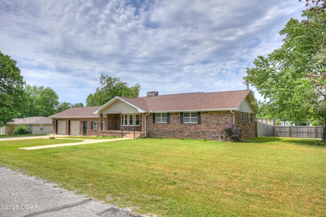 720 Sheridan Ave, Carl Junction, MO 64834 - ranch-style house featuring an attached garage, brick siding, driveway, a chimney, and a porch