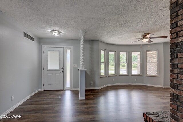 720 Sheridan Ave, Carl Junction, MO 64834 - entrance foyer with ceiling fan, dark wood-style floors, a textured ceiling, and baseboards