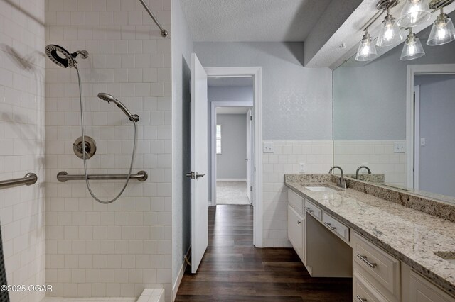 720 Sheridan Ave, Carl Junction, MO 64834 - full bath with vanity, tiled shower, wood finished floors, and wainscoting