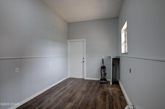 720 Sheridan Ave, Carl Junction, MO 64834 - unfurnished room with wood finished floors, baseboards, and a wainscoted wall