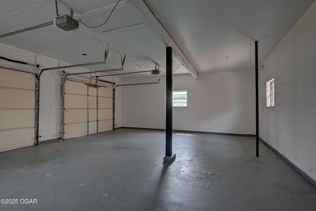 720 Sheridan Ave, Carl Junction, MO 64834 - garage with a garage door opener