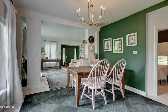 2101 N Florida Ave, Joplin, MO 64801 - dining area with a chandelier and baseboards