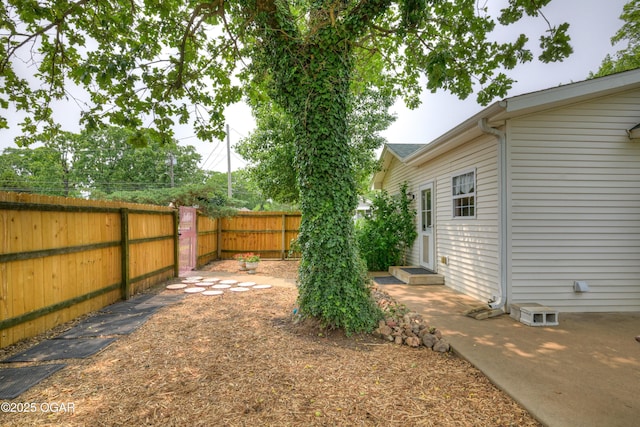 2101 N Florida Ave, Joplin, MO 64801 - fenced backyard featuring a patio area