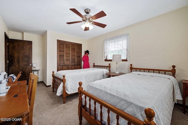 802 Hawthorne Dr, Neosho, MO 64850 - carpeted bedroom with a closet, a ceiling fan, and baseboards