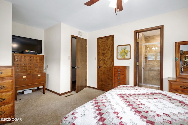 802 Hawthorne Dr, Neosho, MO 64850 - carpeted bedroom featuring baseboards, ceiling fan, and ensuite bathroom