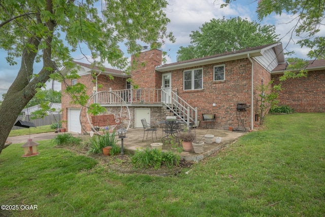 802 Hawthorne Dr, Neosho, MO 64850 - view of front of house with brick siding, a front yard, a chimney, a patio area, and stairs