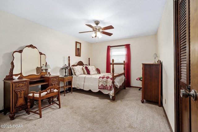 802 Hawthorne Dr, Neosho, MO 64850 - bedroom with light carpet, a ceiling fan, baseboards, and a closet