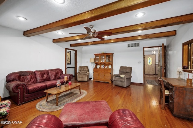 802 Hawthorne Dr, Neosho, MO 64850 - living area with wood-type flooring, recessed lighting, ceiling fan, beamed ceiling, and baseboards
