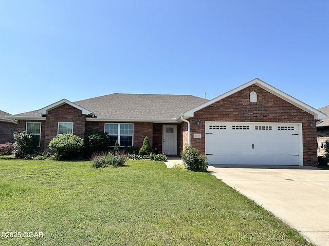 4030 E 23rd St, Joplin, MO 64804 - ranch-style house with an attached garage, a front lawn, driveway, brick siding, and a shingled roof