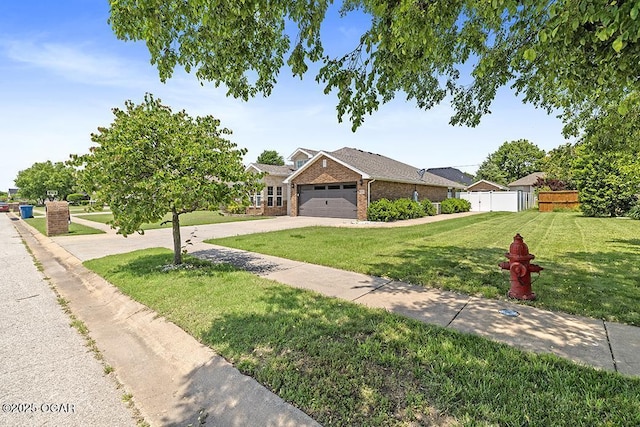 111 Zachary Ln, Carl Junction, MO 64834 - view of front of house with brick siding, a garage, and concrete driveway