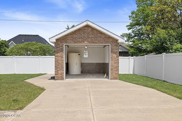 111 Zachary Ln, Carl Junction, MO 64834 - detached garage featuring water heater